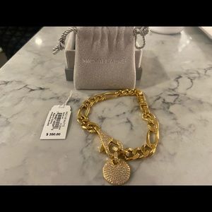 gold MK bracelet